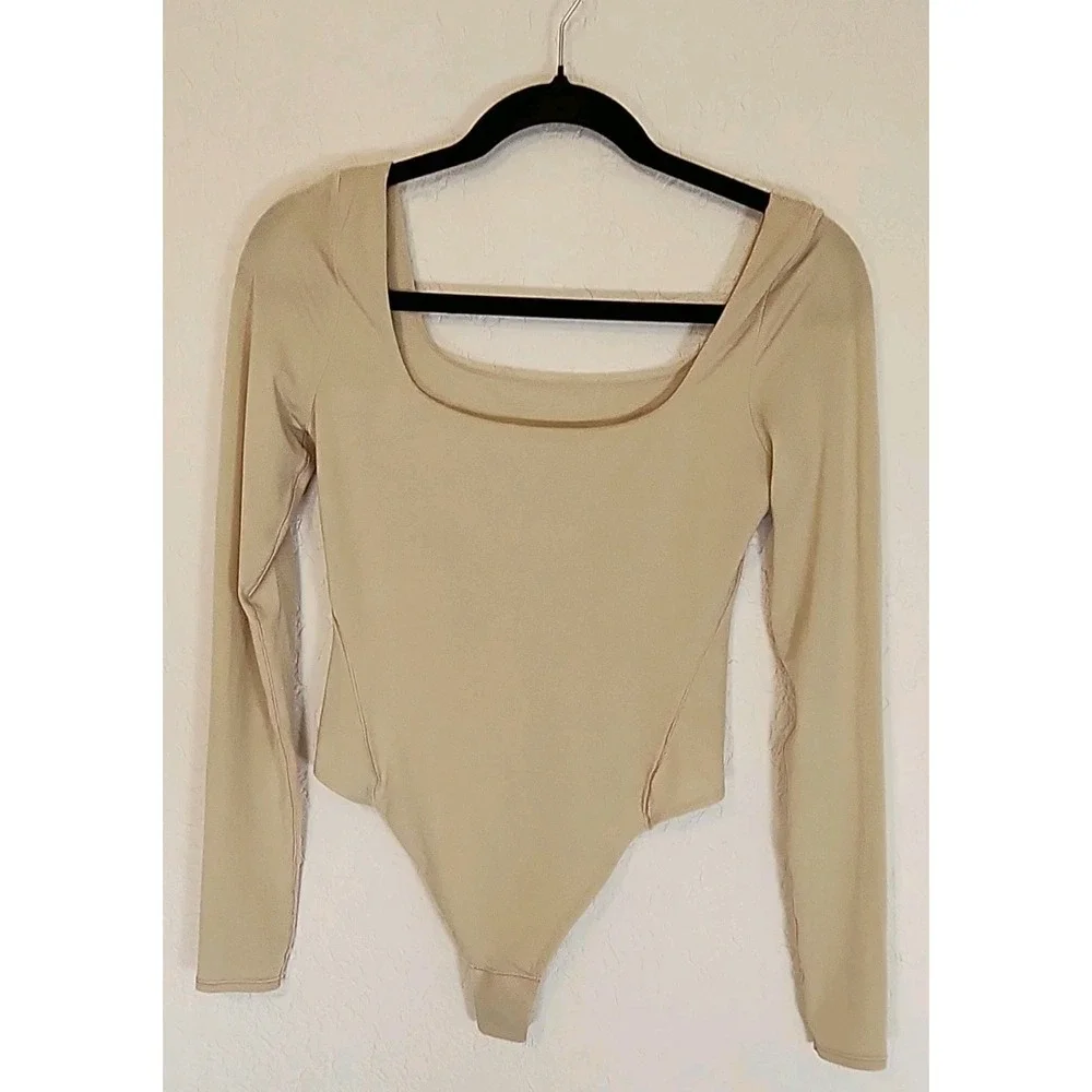 lululemon Wondermost Ultrasoft Nulu Square Neck Lg Sleeve Body suite Size SP Tan